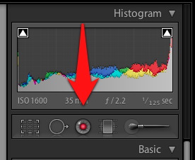 You'll find the red eye fix next to all of the other spot adjustments in the Develop module just under the Histogram.